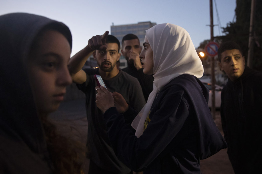 Protester i bostadsområdet Sheikh Jarrah i östra Jerusalem i maj.